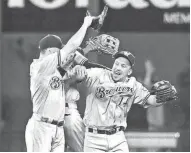  ?? / GETTY IMAGES ?? Fans would like to see more celebratio­ns from Hernan Perez and the Brewers.