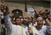  ?? — AP ?? Hurriyat Conference chairman Mirwaiz Umar Farooq shouts slogans along with his supporters during a protest in Srinagar on Friday.