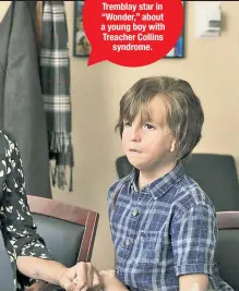  ??  ?? Julia Roberts and Jacob Tremblay star in “Wonder,” about a young boy with Treacher Collins syndrome.