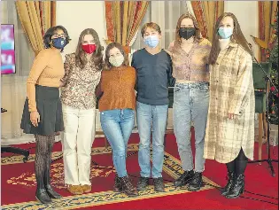  ?? ?? LEFT: Irish UN Youth Delegate, Diandra Ní Bhuachalla (right) pictured after the live Sustainabl­e Sleepover Club podcast in the Metropole Hotel, with Mitchelsto­wn’s Amy O’Brien (3rd from left) and Ayushi M, Eve Lonergan, Cark Dwyer Murray and Gabby O’Keeffe.