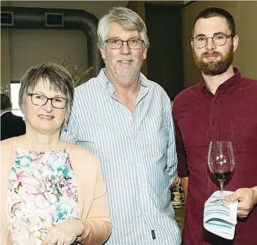  ??  ?? A family affair. Winemaker Alistair Johnson with parents Richard and Marion have broken new ground at Longwarry by establishi­ng the town’s first commercial winery.