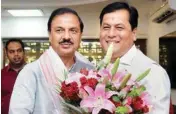  ??  ?? Assam CM Sarbananda Sonowal with MOS for Culture and Tourism (Independen­t Charge), Mahesh Sharma, in New Delhi on Thursday