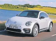  ?? FOTO: HERSTELLER ?? Den neuen Beetle gibt es ab 18.375 Euro. Das Panorama-Glasdach kostet 1080 Euro extra.