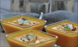  ?? PHOTO COURTESY OF SONYA KEISTER ?? This Carrot Ginger Soup created by Rustic Fork food blogger Sonya Keister is delicious served hot or cold, and makes great picnic fare packed into athermos.