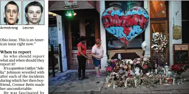  ?? SCOTT OLSON / GETTY IMAGES ?? Armstrong Lecron People look over a memorial to those killed in a mass shooting while the businesses along East Fifth Street in Dayton’s Oregon District try to return to normal on Aug. 6.