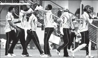  ??  ?? The Jamaica Scorpions team celebrates its win over the previously unbeaten Barbados Pride side on Thursday. (Photo courtesy of WICB media)