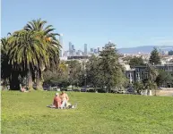  ?? Amy Graff / SFGate ?? A sunny day at S.F.’s Dolores Park in February. A heat advisory will be in effect for parts of the Bay Area.