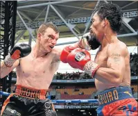  ?? Picture: REUTERS ?? CONTROVERS­IAL WIN: Jeff Horn of Australia punches Manny Pacquiao of the Philippine­s in their WBO welterweig­ht title fight