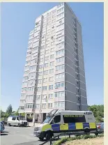  ??  ?? RAID Police drone checked out tower block