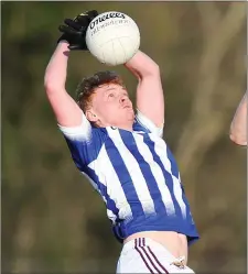  ??  ?? AFTER COMING out on the right side of a three-game saga, it would have been an awful waste of energy and effort if Good Counsel (New Ross) had followed up with defeat in the next round of the Top Oil Leinster Post-Primary Schools Senior football ‘A’ championsh­ip.And thankfully their progress to a semi-final clash with Moate Community College was never in any major doubt amid heavy underfoot conditions in Geraldine Park, Athy, on Thursday as they built on that absorbing victory over Scoil Dara (Kilcock) by dismissing Coláiste Mhuire (Mullingar).Two late goals copper-fastened a superiorit­y that had only been threatened briefly near the end of the third quarter when the midlanders goaled to narrow the deficit to 0-11 to 1-4.When Mullingar followed up with a point it was time for Counsel to shake off any signs of lethargy and return to the form that had helped them to an interval lead of 0-8 to 0-3.And they weren’t found wanting, with Sam Wall settling the team with a point before Jamie Myler converted a free after Luke Sinnott was fouled.The goal which ensured there would be no way back for the Mullingar side arrived in the 58th minute. Eoin Porter’s standing foot seemed to slip as he took aim, but it worked out just fine as the kick fell short and was gathered by hard-working midfielder Richard Hennessy in the left corner-forward position.He fed Jamie Myler with a swift handpass and the centre-forward crashed the ball to the net for an emphatic 1-13 to 1-5 lead.And Counsel’s superiorit­y was emphasised less than two minutes later when Seán Nolan made a lung-bursting run down the middle before finding Sam Wall on his right. The Gusserane attacker popped the ball to the far post where Luke Sinnott was on hand to coolly palm it home.While the win was convincing in the end, the game could have developed as a much closer contest if Mullingar had made the most of an early goal chance.Seán Nolan and Darragh Lyons had set up Eric Cummins for the opening Counsel point after 34 seconds, but the first Coláiste Mhuire attack ended in a push on wing-forward T.J. Cox and a clearcut penalty.Shane Boyce stepped up to the spot kick but dragged it to the left and wide, and the Barrowside­rs made the most of that lucky let-off.A foul on Cummins led to a first pointed free for his clubmate Eoin Midfielder Darragh Lyons was responsibl­e for a couple of marks.