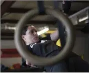  ?? LISA MARIE PANE — THE ASSOCIATED PRESS ?? Martinez performs a body row exercise during a workout at the Crossfit Goat gym in Dacula, Georgia on Sept. 26.