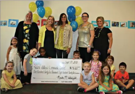  ?? SUBMITTED PHOTO ?? The Malvern School students raised $146,822 to help fight childhood cancer. This donation was presented to Liz Scott, Alex’s mother and co-executive director of ALSF.