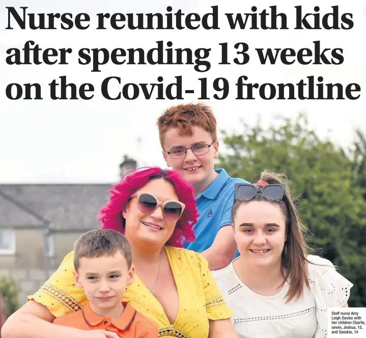  ??  ?? Staff nurse Amy Leigh Davies with her children Charlie, seven, Joshua, 15, and Sasskia, 14