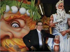  ?? ASSOCIATED PRESS FILE PHOTO ?? Blaine Kern, Sr. poses for a photograph with some of the creations he built for Mardi Gras floats in New Orleans. The man known as “Mr. Mardi Gras” for helping to convert the annual pre-Lenten celebratio­n into a giant event in New Orleans has died. News outlets report that Blaine Kern Sr. died Thursday.