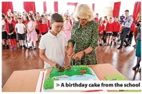  ?? ?? > A birthday cake from the school