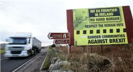  ??  ?? A Brexit referendum poster on Dublin road at the Border in Co Armagh in 2016