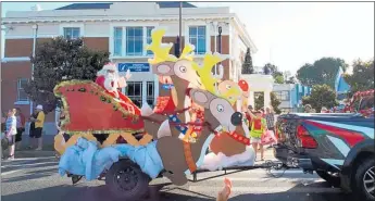  ??  ?? The Paeroa Santa Parade is always a big hit with families and residents.