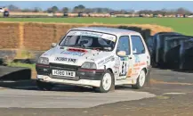  ??  ?? Lochgilphe­ad’s Innes Mochrie and Minard’s Del Galbraith in their Lotus Metro.