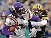  ?? Mike Roemer / Associated Press ?? Randy Moss, left, played for five NFL teams, including two stints with the Vikings, on his way to being nominated for the Pro Football Hall of Fame.