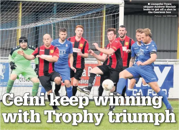  ?? Picture: DAI SINCLAIR ?? Llangefni Town skipper Andrew Sinclair looks to get off a shot in the Gaerwen box