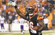  ?? Frank Victores / Associated Press ?? Cincinnati’s Shawn Williams celebrates his intercepti­on in the second half. The Bengals picked off two Joe Flacco passes.