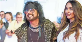  ?? GEOFF ROBINS/GETTY IMAGES ?? Nikki Sixx and his wife, Courtney, are expecting a baby.