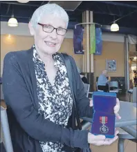  ?? JEREMY FRASER/CAPE BRETON POST ?? Evelyn Wells holds the Sovereign’s Medal for Volunteers, awarded by the Governor General of Canada in recognitio­n of significan­t volunteer contributi­ons to the community. Wells recently received the award for her volunteer work in the Florence and...