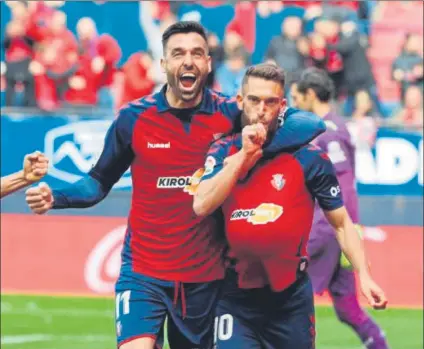  ?? FOTO: EFE ?? Roberto Torres (d) celebra su gol al Espanyol en la última jornada de Liga que se disputó antes del parón