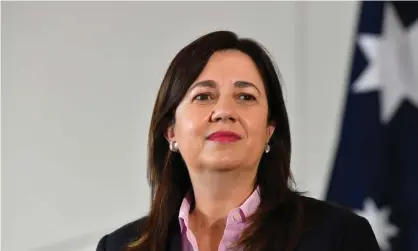  ?? Photograph: Darren England/AAP ?? Queensland premier Annastacia Palaszczuk says she must travel to Tokyo to secure Brisbane’s bid to host the 2032 Olympic Games as 29,000 people sign petition calling for trip not to go ahead.