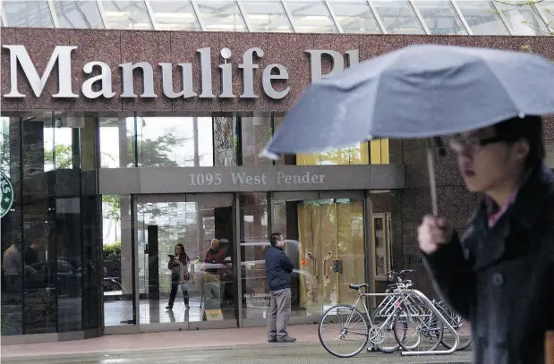  ?? JONATHAN HAYWARD / THE CANADIAN PRESS FILES ?? Manulife’s profit for the quarter ended Sept. 30 surged 42 per cent to $1.57 billion.