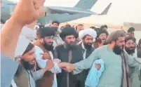  ?? AL HIJRAT TV/AFP VIA GETTY IMAGE ?? Footage from Al Hijrat TV shows Mullah Abdul Ghani Baradar’s arrival in Afghanista­n on Aug. 17. The Taliban leader chose to touch down in Afghanista­n's second biggest city, Kandahar.