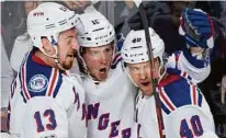  ?? AP ?? Grabner mit Linien-Kollegen JT Miller und Kevin Hayes