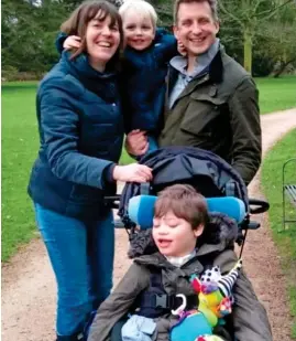  ??  ?? NO HOME VISIT: Kate and Clive Jones with sons Josh, front, and Seb