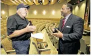  ??  ?? rry Ayers (left), of Descendant­s of Confederat­e Veterans, talks with Gregory Vincent, UT vice president for diversity and community engagement, after the hearing about the
Jefffferso­n Davis statue, which Ayers says should stay at UT.