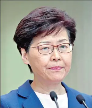  ?? ANTHONY WALLACE/AFP ?? Hong Kong Chief Executive Carrie Lam holds a press conference at the government headquarte­rs on Tuesday.