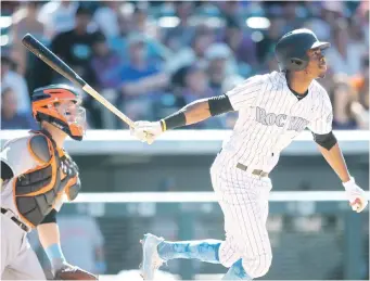  ??  ?? Raimel Tapia remolcó la carrera ganadora en el encuentro frente a los Gigantes.