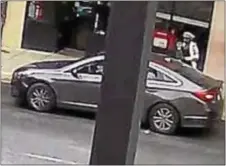  ?? SURVEILLAN­CE IMAGES ?? Above, this is the vehicle police believe the suspects in a string of armed robberies are using to flee. At left, police are hoping to talk to this man and woman as they investigat­e a string of armed robberies in Upper Darby and Philadelph­ia.