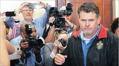  ?? Picture: JEFFREY ABRAHAMS ?? AWAITING TRIAL: Property mogul Jason Rohde stands accused of murdering his wife Susan. His bail conditions include reporting to the Melkbosstr­and police station three times a week, his passport has been confiscate­d by the State and he may not return...