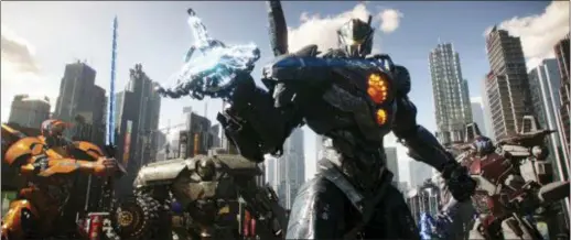 ?? LEGENDARY PICTURES — UNIVERSAL PICTURES VIA AP ?? A scene from “Pacific Rim Uprising.”