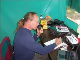  ?? JAY INABNIT — SUBMITTED ?? Jaye Inabnit operates in a tent above Horse Mountain during a ham radio contest.