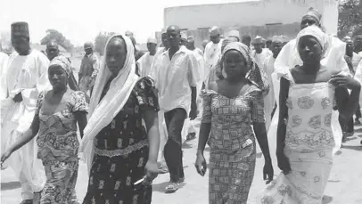  ??  ?? These four female students of the Government Girls Secondary School in Chibok managed to escape from the Islamist gunmen who abducted them