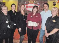  ?? PAUL FORSYTH NIAGARA THIS WEEK ?? Eric Marcon, president of the Howard JohnsonHot­el by the Falls and the Denny’s restaurant in Niagara Falls, has pledged 14,400 eggs to Project SHARE over the next six months. He’s shown with Project SHARE’s Pam Sharp and restaurant staff Cathy Norkett, Cierra Michener, general manager Pat Ross and Sandie Bateman.