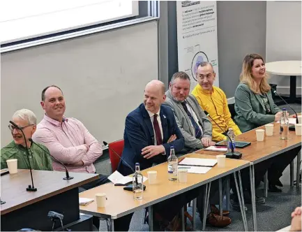  ?? Iain Buist ?? > A lighter moment for the candidates at the North East mayoral hustings at Newcastle University. From left are Andrew Gray (Green), Guy Renner-Thompson (Conservati­ve), Jamie Driscoll (independen­t), Paul Donaghy (Reform UK), Aidan King (Liberal Democrat) and Kim McGuinness (Labour)