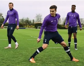  ?? GETTY IMAGES ?? Three of their own: Kane (left), Winks and Onomah yesterday