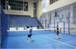  ??  ?? ↑
Players in action during their NAS Padel Championsh­ip match.