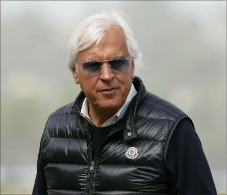  ?? JAE C. HONG — THE ASSOCIATED PRESS FILE ?? Trainer Bob Baffert waits for the Breeders’ Cup horse races at Del Mar racetrack in Del Mar on Nov. 5, 2021. A federal judge on Friday, Feb. 17, 2023, denied Baffert’s request to lift his two-year suspension by Churchill Downs Inc., ruling that the Hall of Fame trainer did not prove its discipline hurt his business and reputation.