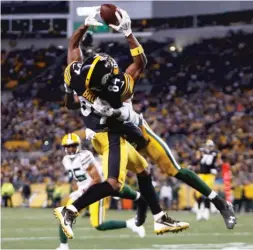  ?? | GETTY IMAGES ?? Antonio Brown had 10 catches for 169 yards against the Packers.