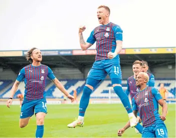  ??  ?? Shane Sutherland celebrates scoring to give Inverness a 2-1 lead