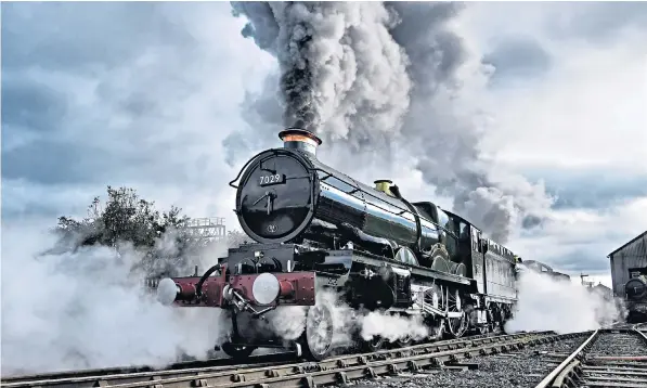  ??  ?? Clun Castle builds up steam in Tyseley, Birmingham. Vintage Rail, a publicly owned mainline rail company wants to inspire a love of steam in a younger, more diverse demographi­c through the increased use of social media