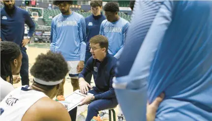  ?? COURTESY OF UNIVERSITY OF HAWAII ?? Old Dominion’s Kieran Donohue, center, took over as the acting head coach when Jeff Jones suffered a heart attack while the team was in Hawaii for a tournament in late December.